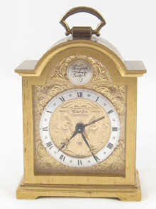A Georgian style brass cased
