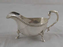 A Georgian style silver sauceboat