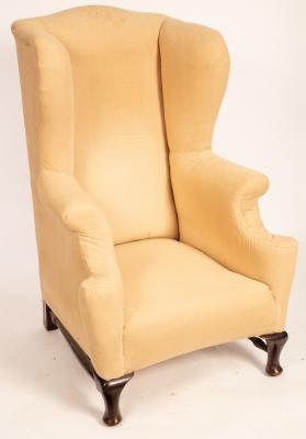 A Georgian style wingback armchair