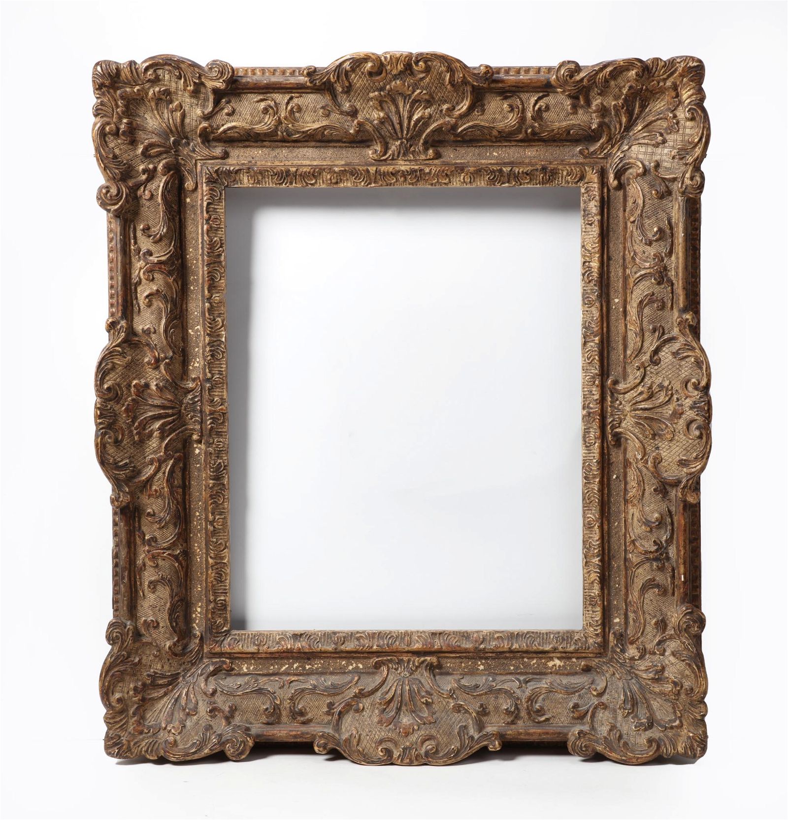 A GERMAN BAROQUE GILTWOOD FRAMEA
