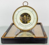A GERMAN BRASS TABLE-TOP BAROM