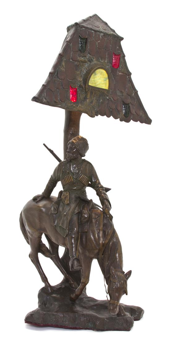 A German Bronzed Metal Figural Lamp