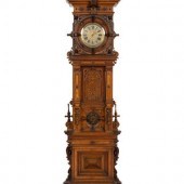 A German Carved Walnut and Mar