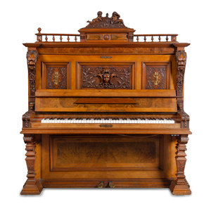 A German Carved Walnut Upright