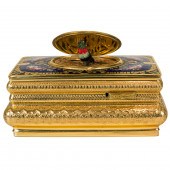 A GERMAN ENAMELLED GILT SINGIN