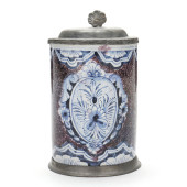 A GERMAN FAIENCE PEWTER MOUNTE