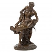 A GERMAN PATINATED BRONZE FIGU
