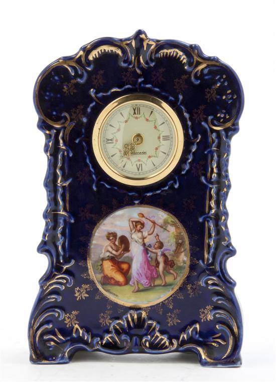 * A German Porcelain Cased Mantel
