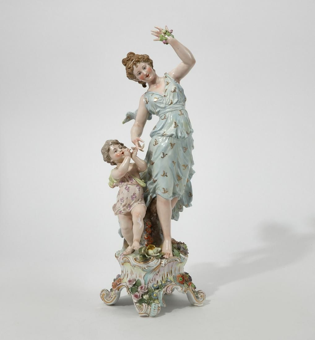 A GERMAN PORCELAIN FIGURAL GROUPA