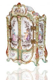 A GERMAN PORCELAIN VANITY DRES