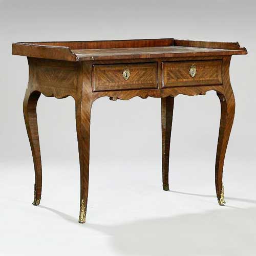 A German Rococo Figured Walnut