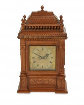 A GERMAN WALNUT BRACKET CLOCKA