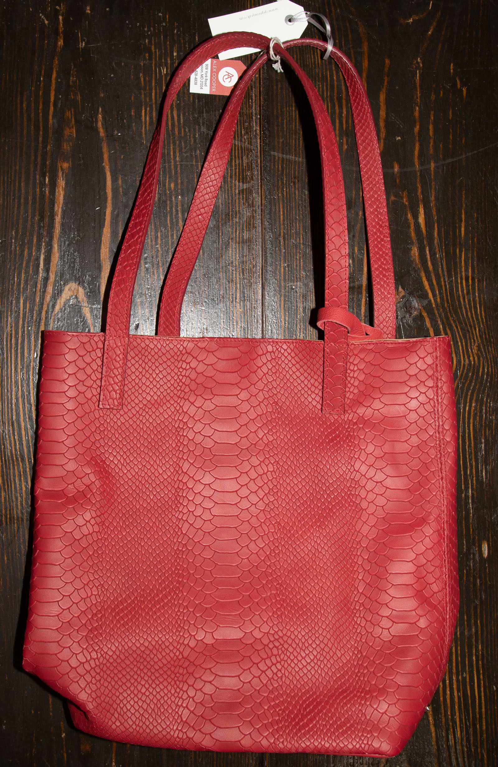 A GIGI NEW YORK EMBOSSED LEATHER
