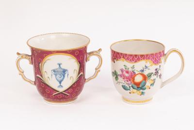 A Giles decorated coffee cup and