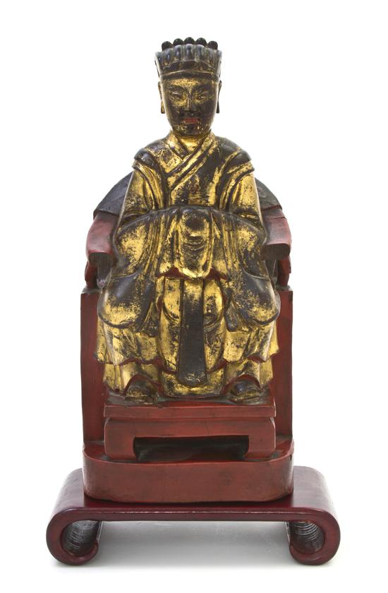 A Gilt and Lacquered Wood Figure of