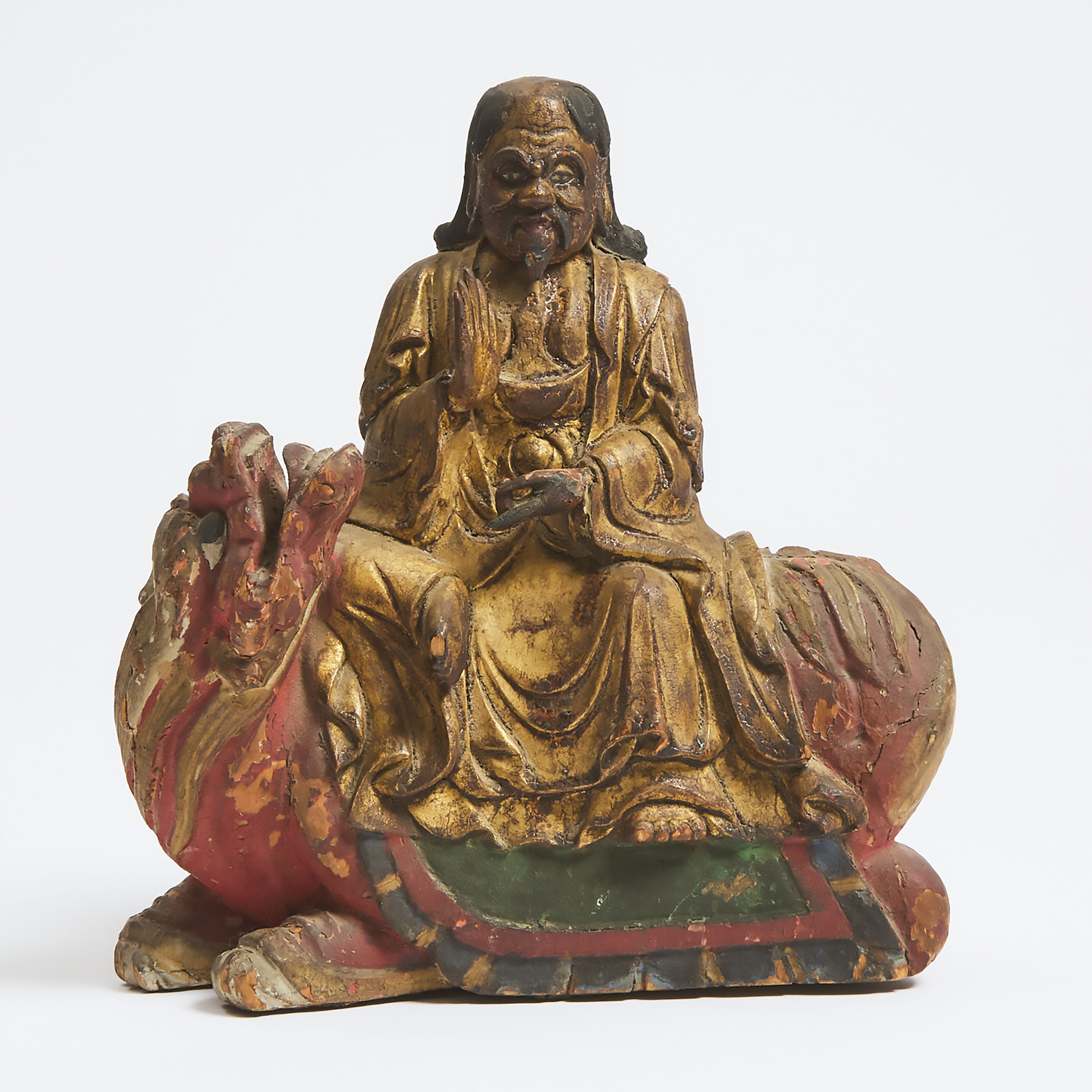 A Gilt and Polychromed Wood