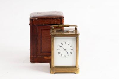 A gilt brass cased carriage