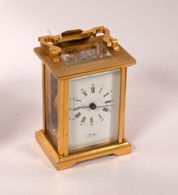 A gilt brass cased carriage