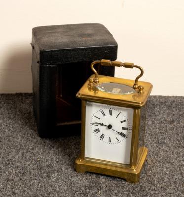 A gilt brass cased carriage