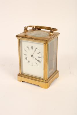 A gilt brass cased carriage