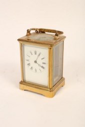 A gilt brass cased carriage cl