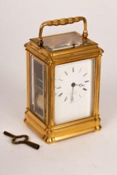 A gilt brass eight-day, half-h