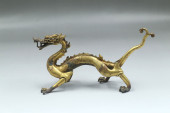 A GILT BRONZE DRAGON FIGURINE<