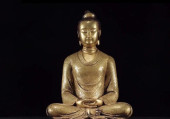 A GILT BRONZE ENGRAVED SITTING