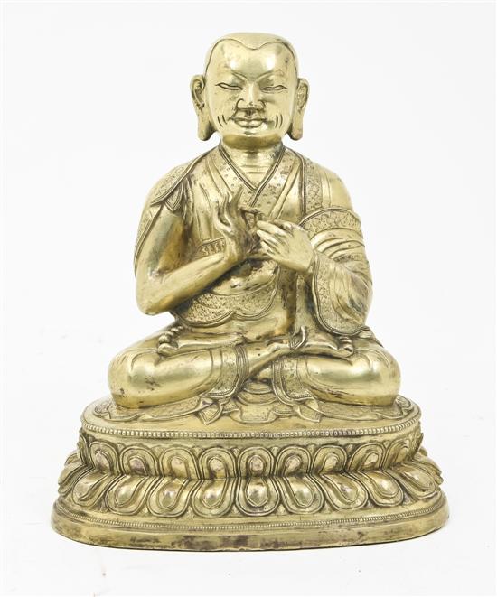 A Gilt Bronze Figure depicting a