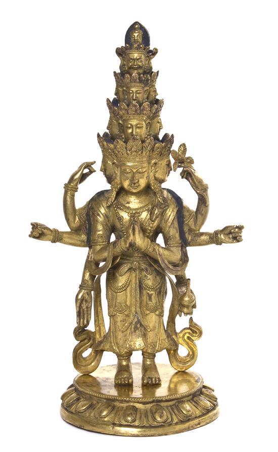 A Gilt Bronze Figure of a