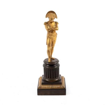 A gilt bronze figure of Napoleon on