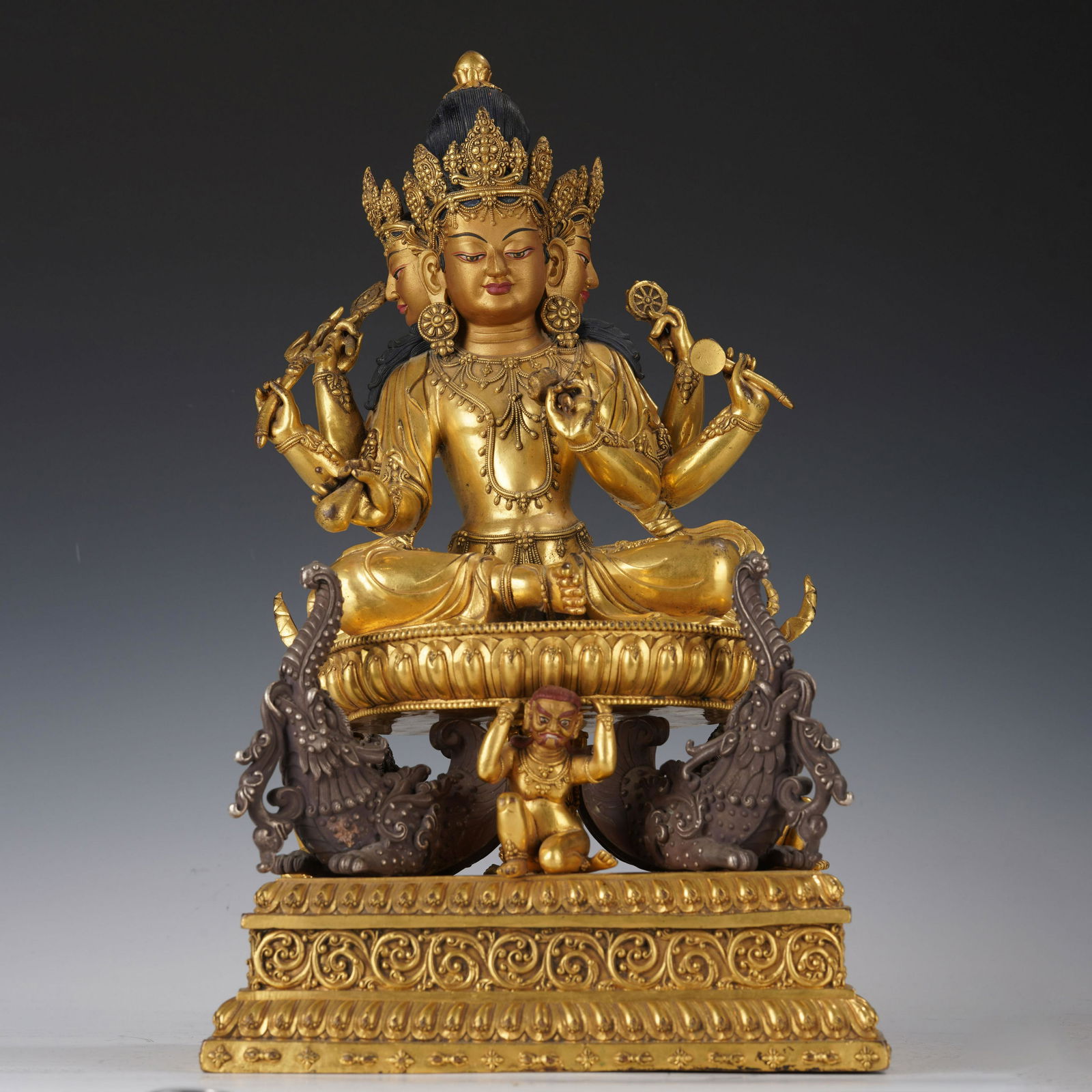 A GILT BRONZE FIGURE OF BUDDHA