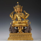 A GILT BRONZE FIGURE OF BUDDHA