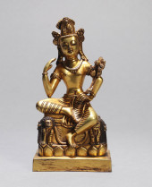A GILT-BRONZE FIGURE OF A BODH
