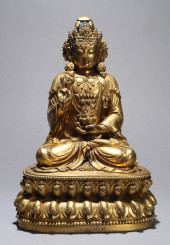 A GILT-BRONZE FIGURE OF A BODH