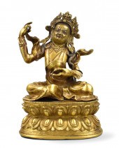 A GILT-BRONZE FIGURE OF PADMAS
