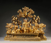 A GILT-BRONZE FIGURE OF SHAKYA