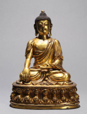 A  GILT-BRONZE FIGURE OF SHAKY