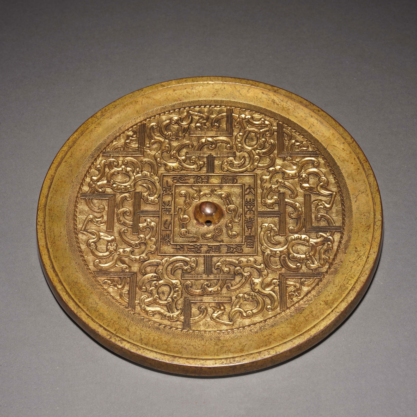 A GILT BRONZE MIRROR,QINGA GILT