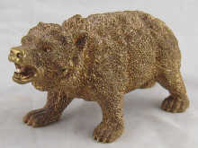 A gilt bronze model of a bear