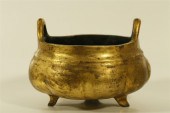A GILT-BRONZE PUMPKIN-SHAPED C