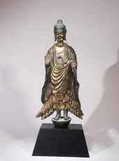 A GILT-BRONZE SANDALWOOD BUDDH