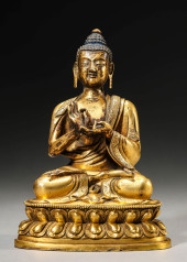 A GILT-BRONZE SHAKYAMUNI BUDDH