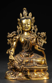 A GILT-BRONZE TARA FIGURE<br>A