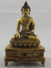 A gilt bronze Tibetan figure o