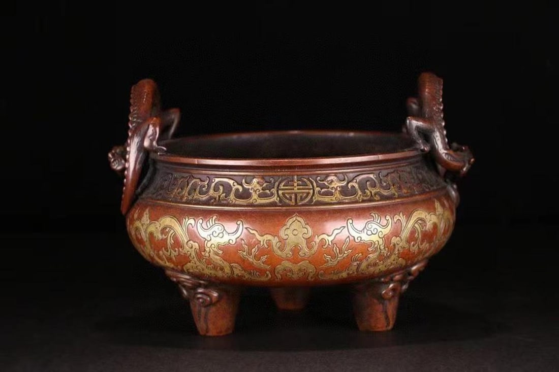 A GILT BRONZE TRIPOD DOUBLE