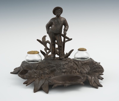 A Gilt Cast Iron Inkwell A cast