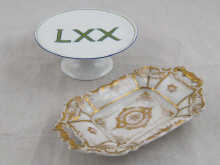 A gilt ceramic pin tray by