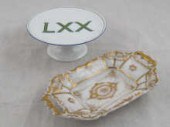 A gilt ceramic pin tray by Tie