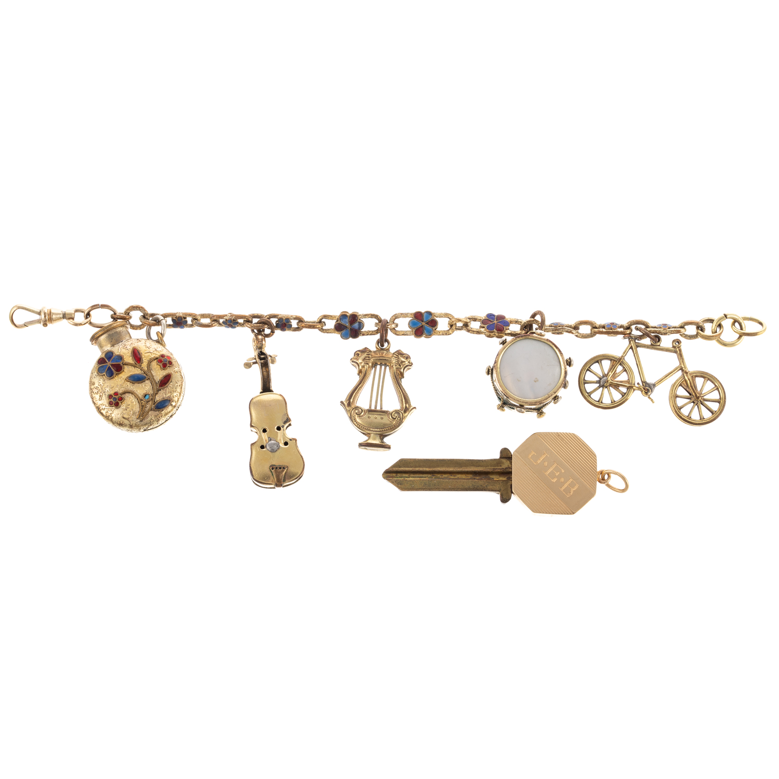 A GILT CHARM BRACELET & 14K KEY